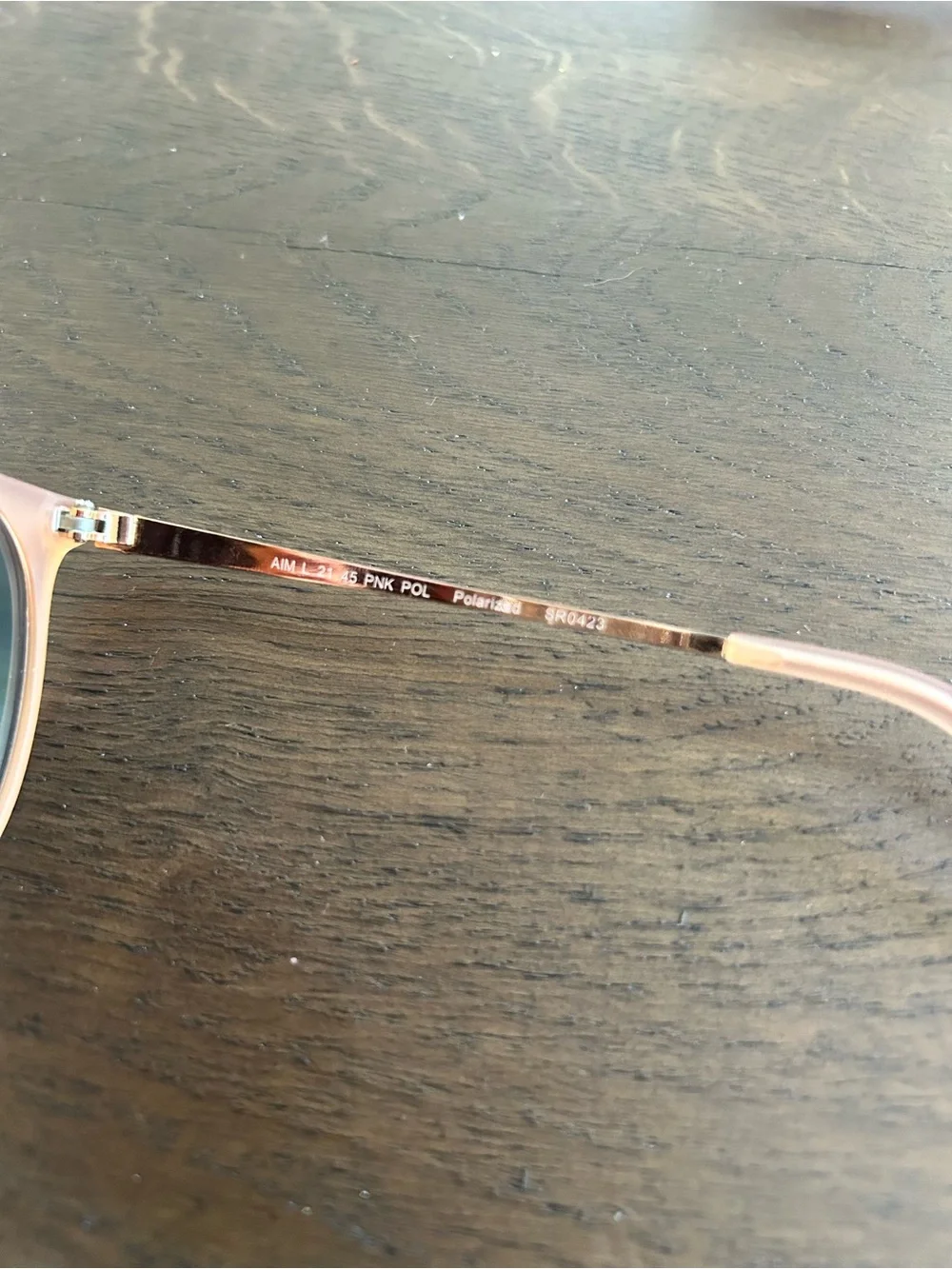 Pink polarized rounded sunglasses